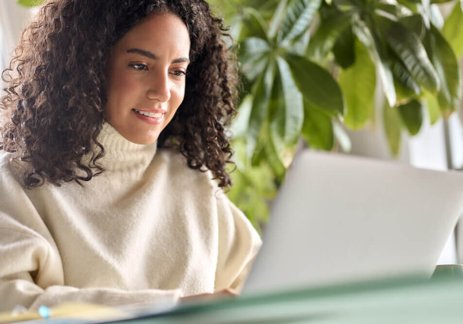 woman looking at laptop